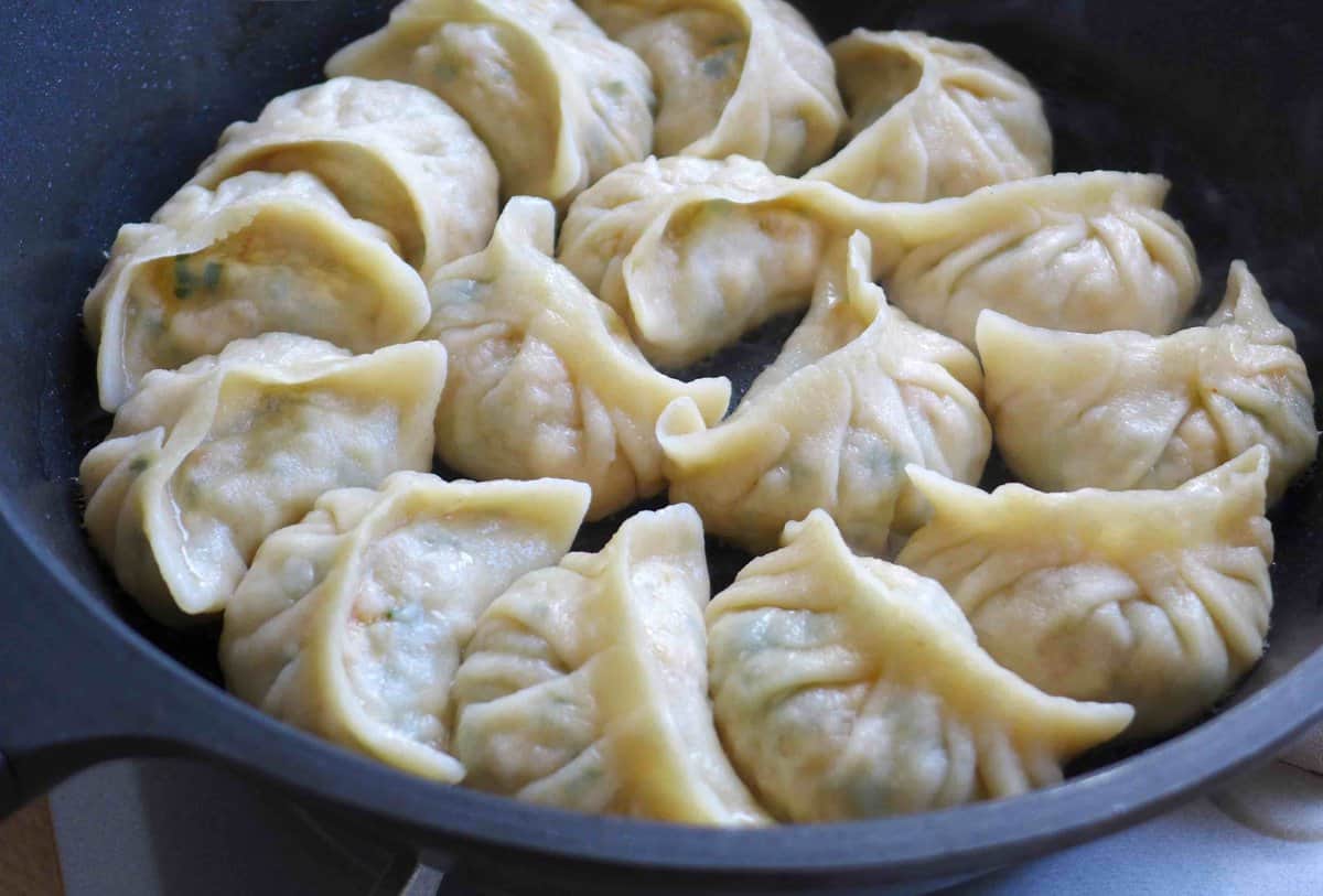 pan-frying dumplings.
