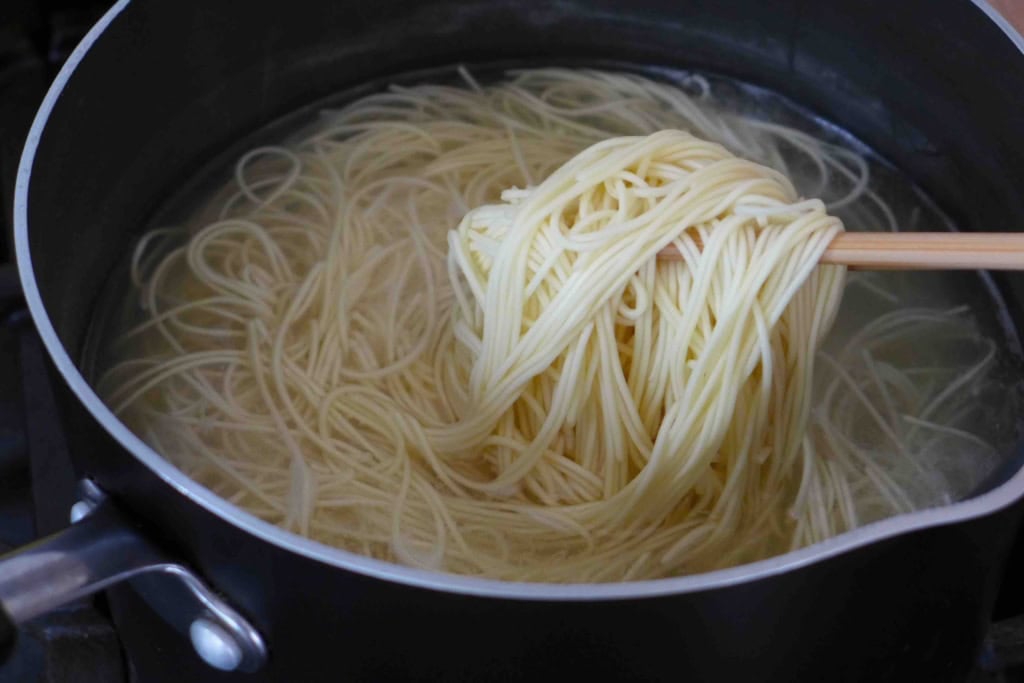 cooking noodles in water.