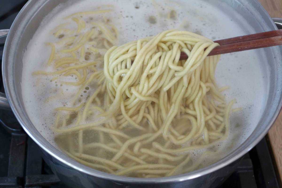 cooking noodles in water.