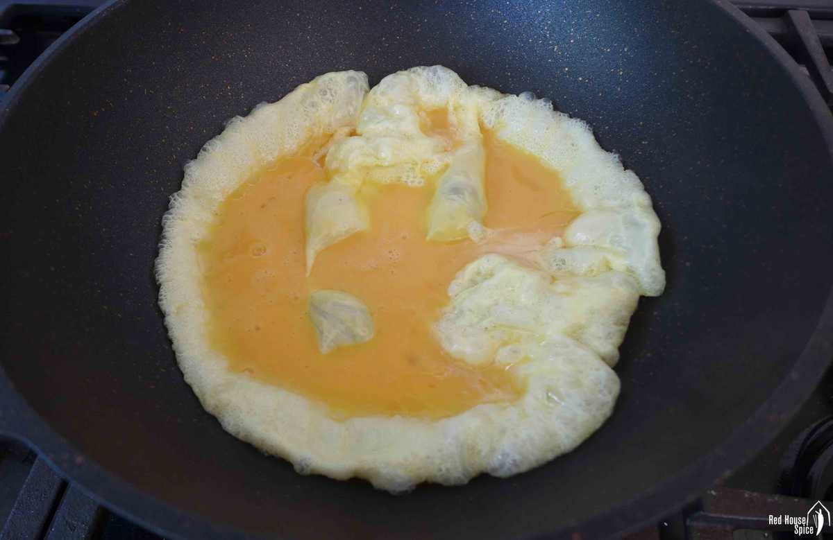 beaten egg cooked in oil