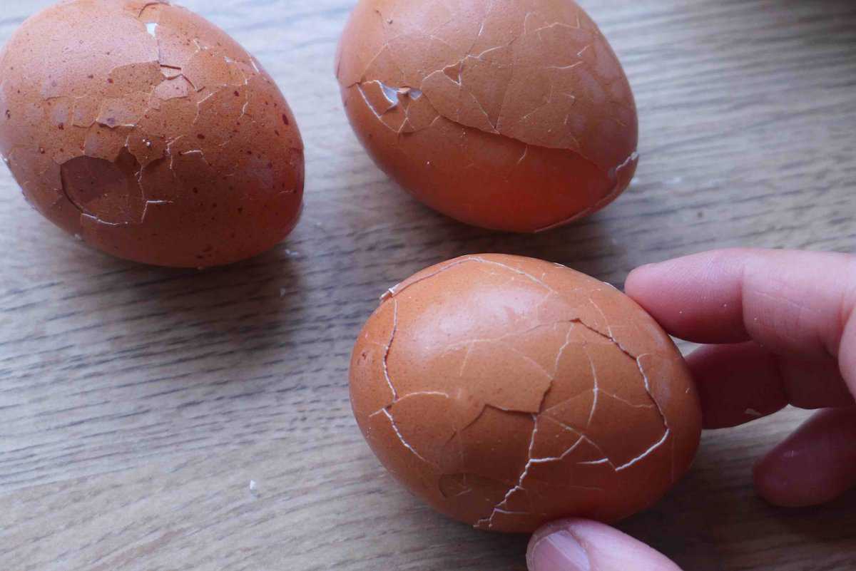 Boiled eggs with cracked shells.