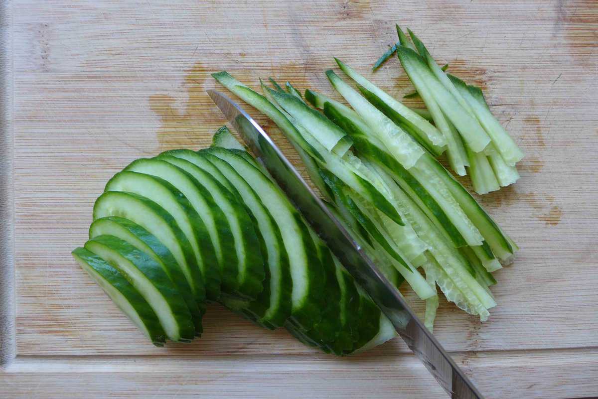 cutting cucumber into matchsticks.