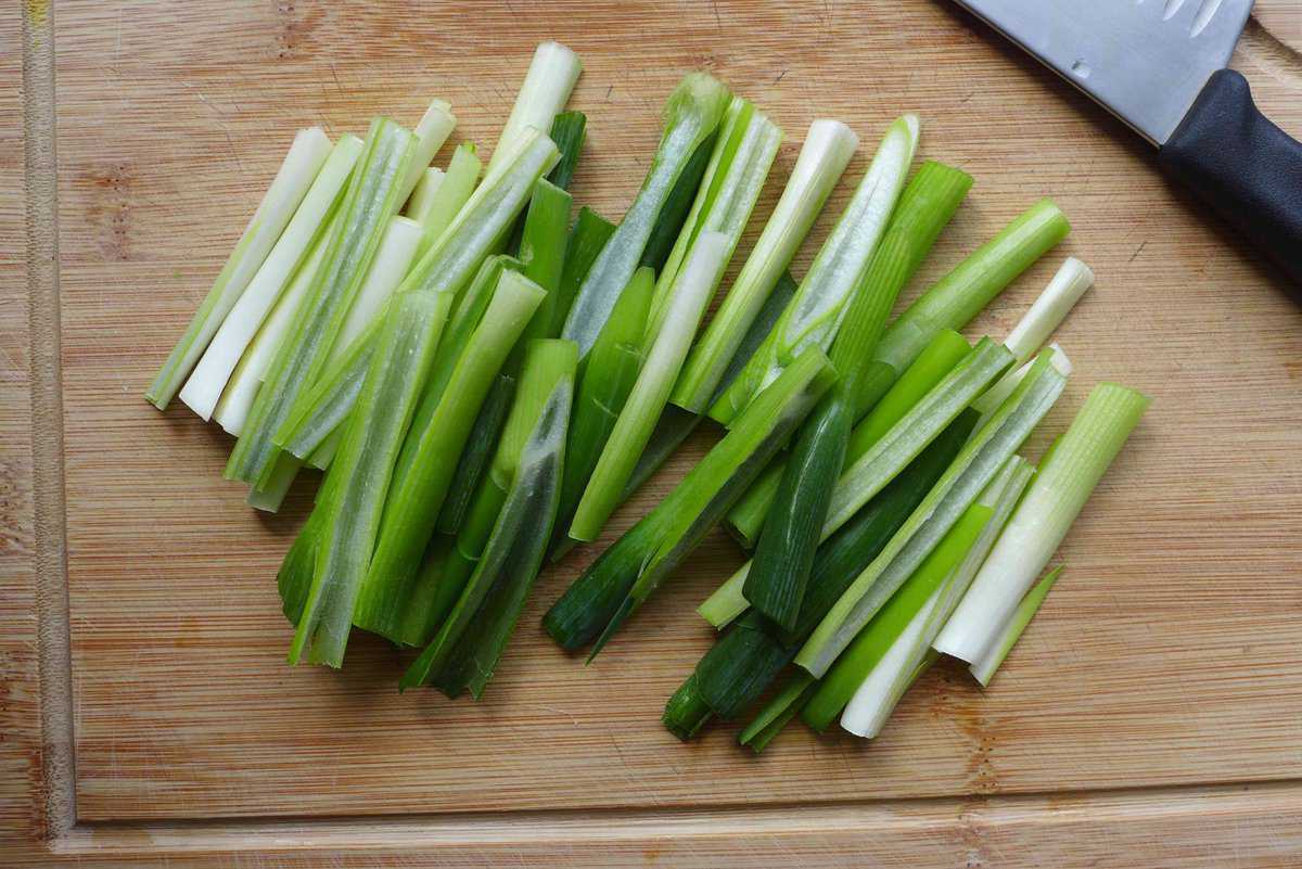 cutting scallions.