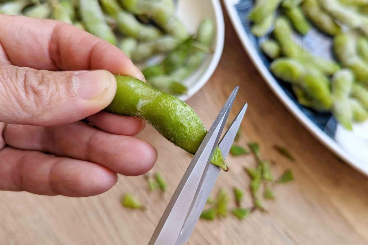 trimming edamame.