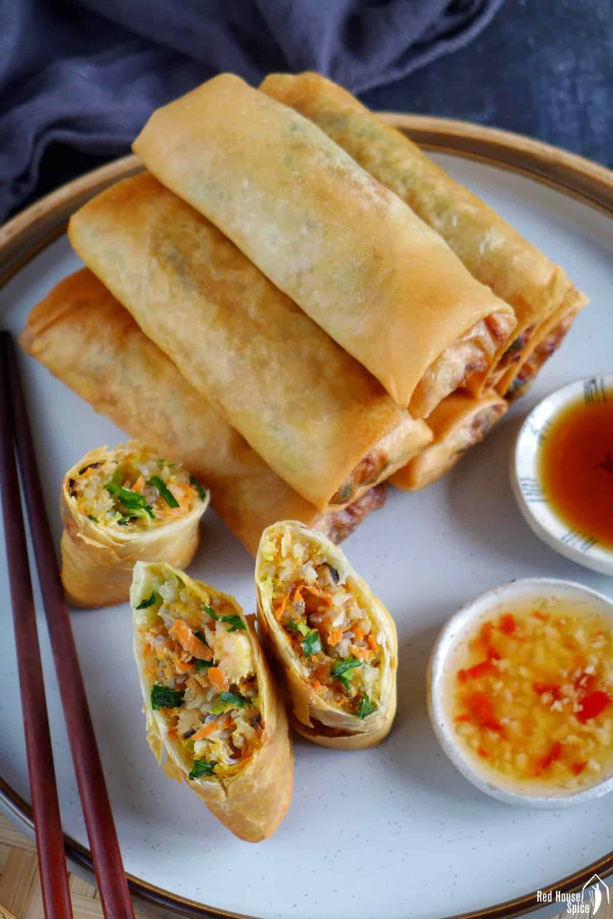 whole spring rolls and some halved ones