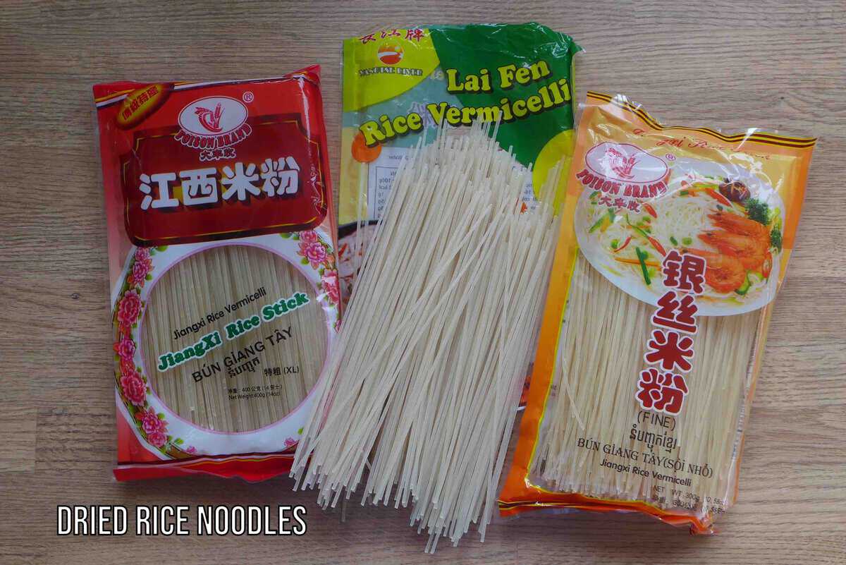 three packages of dried rice noodles.