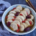 Sliced drunken chicken in a bowl