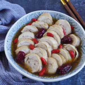 Sliced drunken chicken in a bowl