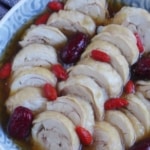sliced Chinese drunken chicken with overlay text that says drunken chicken