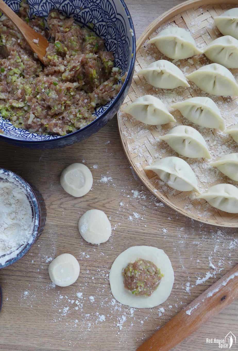dumpling filling, a dumpling wrapper and assembled dumplings