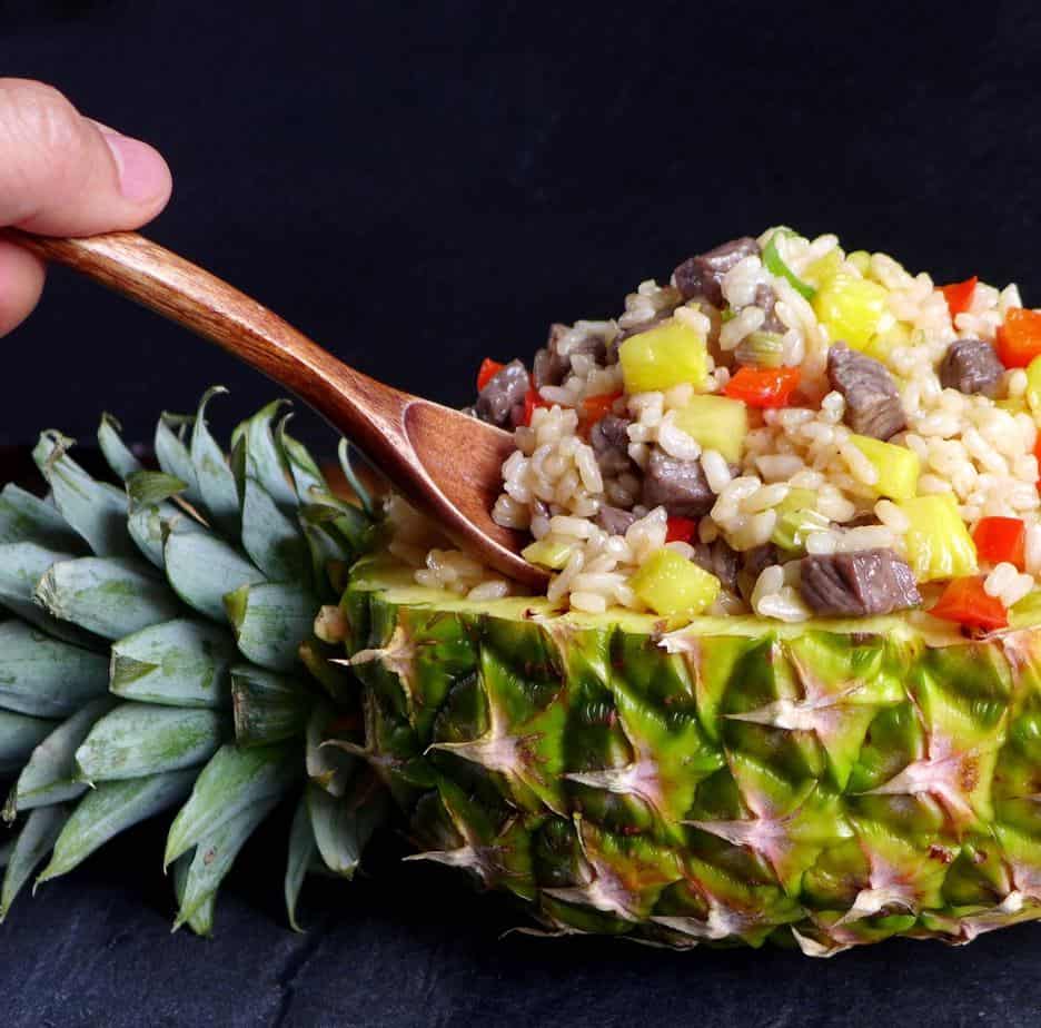 Beef fried rice inside a pineapple shell