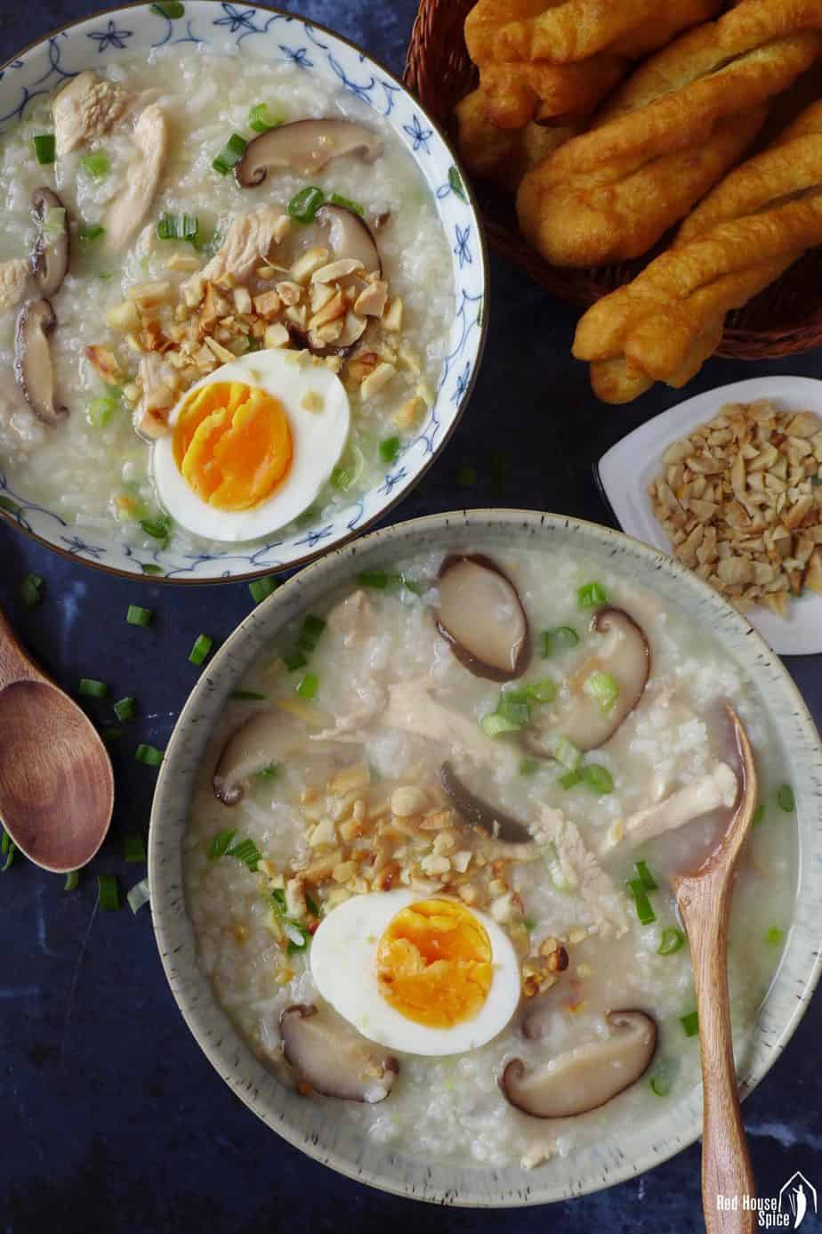 two bowls of congee with chicken & mushroom