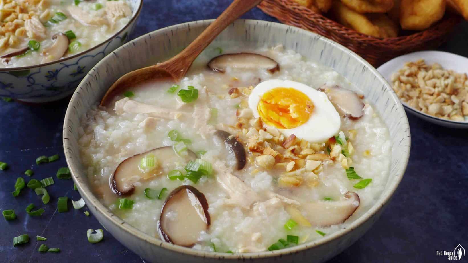 Chinese congee with chicken, egg and mushroom
