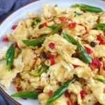 stir-fried egg and pickled chili with overlay text that says egg and pickled chili