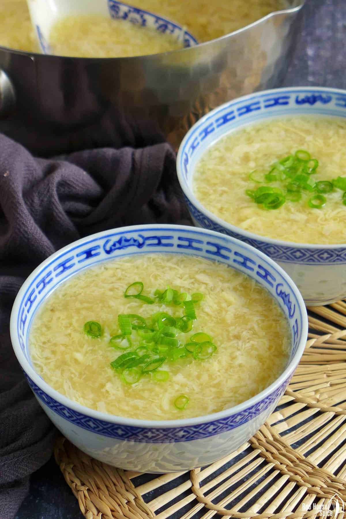 two bowls of egg drop soup.
