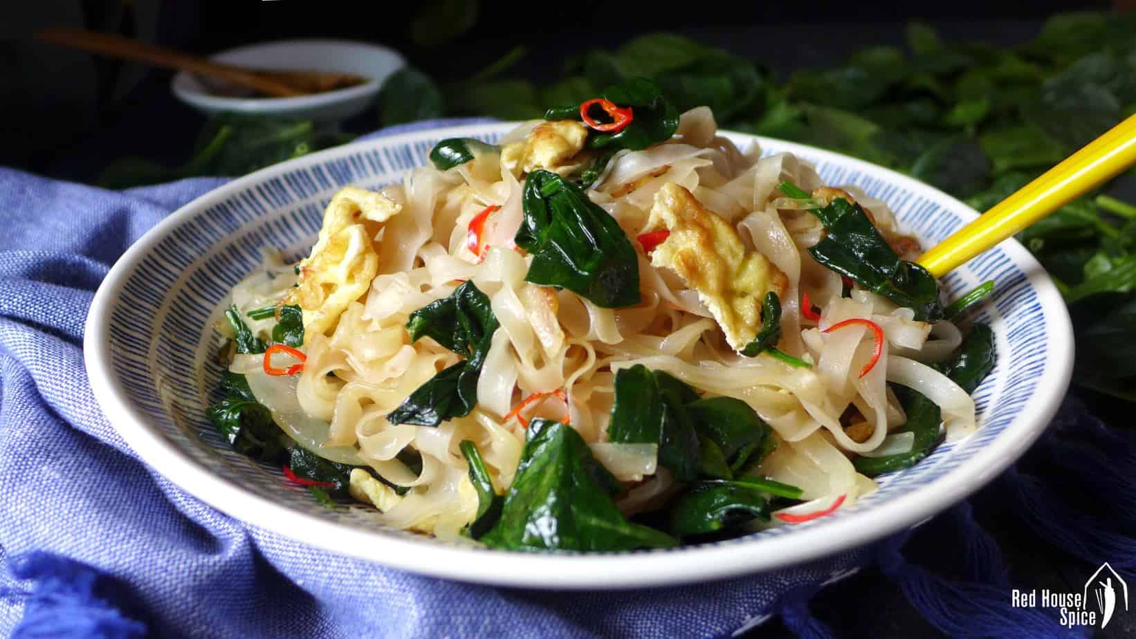fried rice noodles with egg & spinach