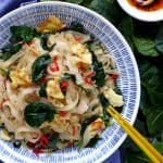 A plate of egg fried rice noodles