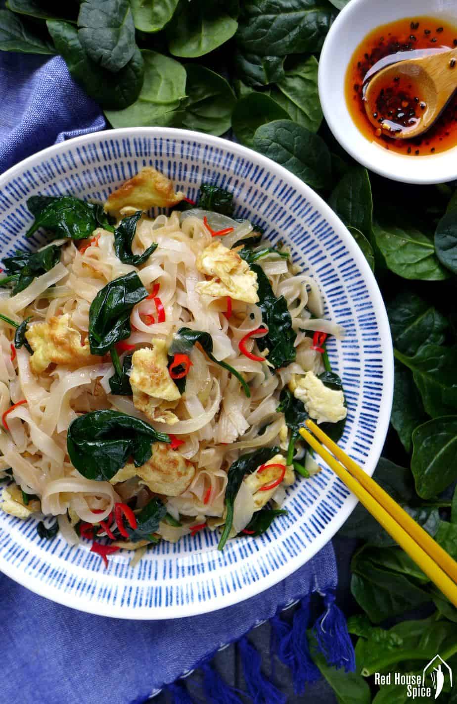 A plate of egg fried rice noodles.