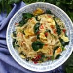 A plate of egg fried rice noodles