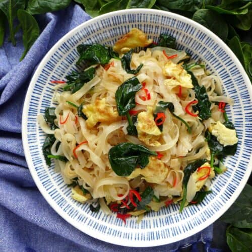 A plate of egg fried rice noodles