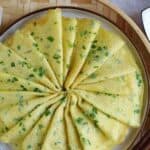 A plate of Chinese egg & scallion crepes