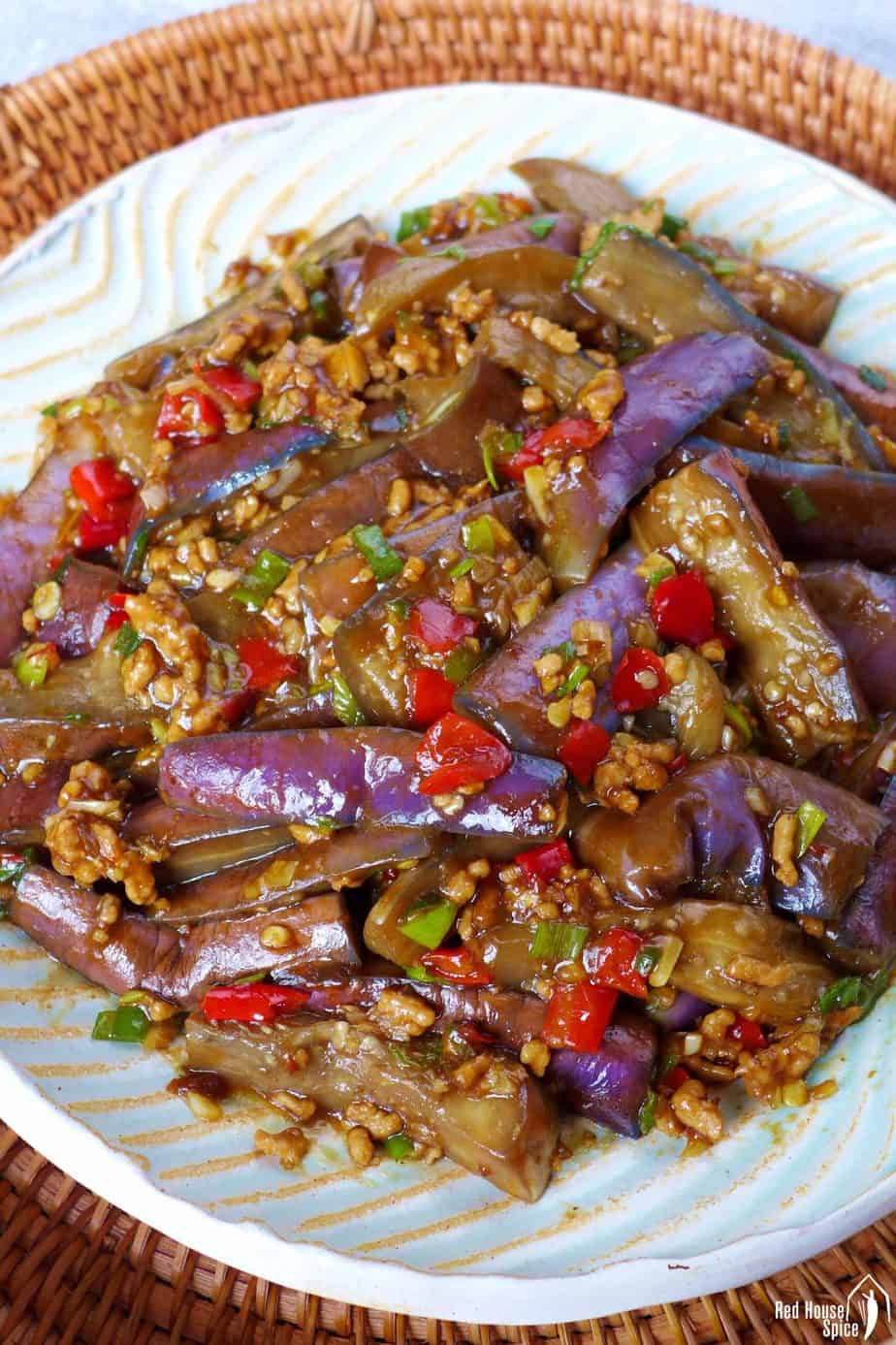 A plate of stir-fried eggplant with garlic sauce