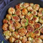Five spice flavoured potatoes with overlay text that says spicy five spice potato