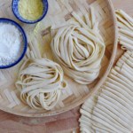 homemade noodles arranged into nest balls