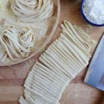 Chinese homemade noodles with overlay text that says homemade noodles