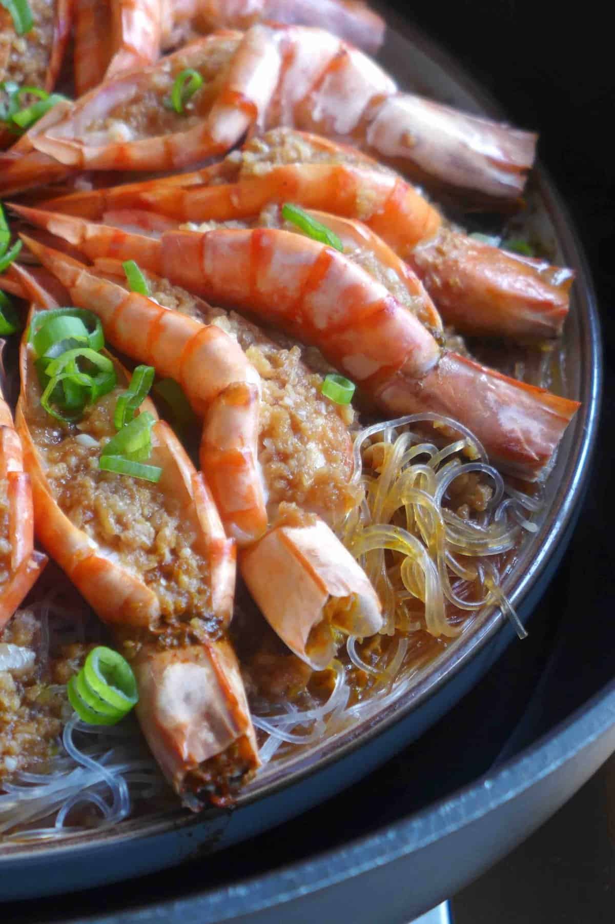 cooked shrimp and vermicelli in a steamer.