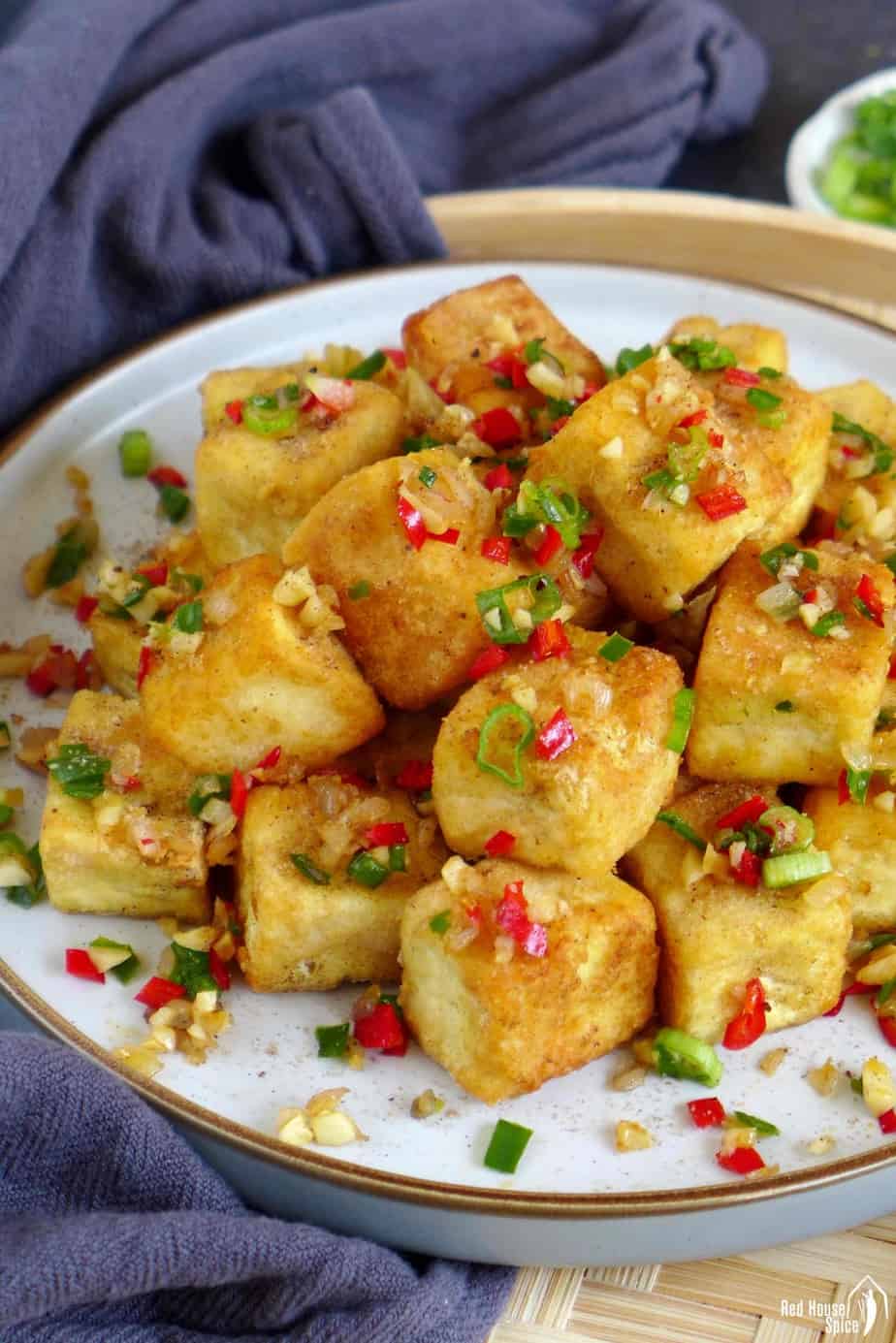 Salt and pepper tofu sprinkled with minced chili pepper, garlic and shallots