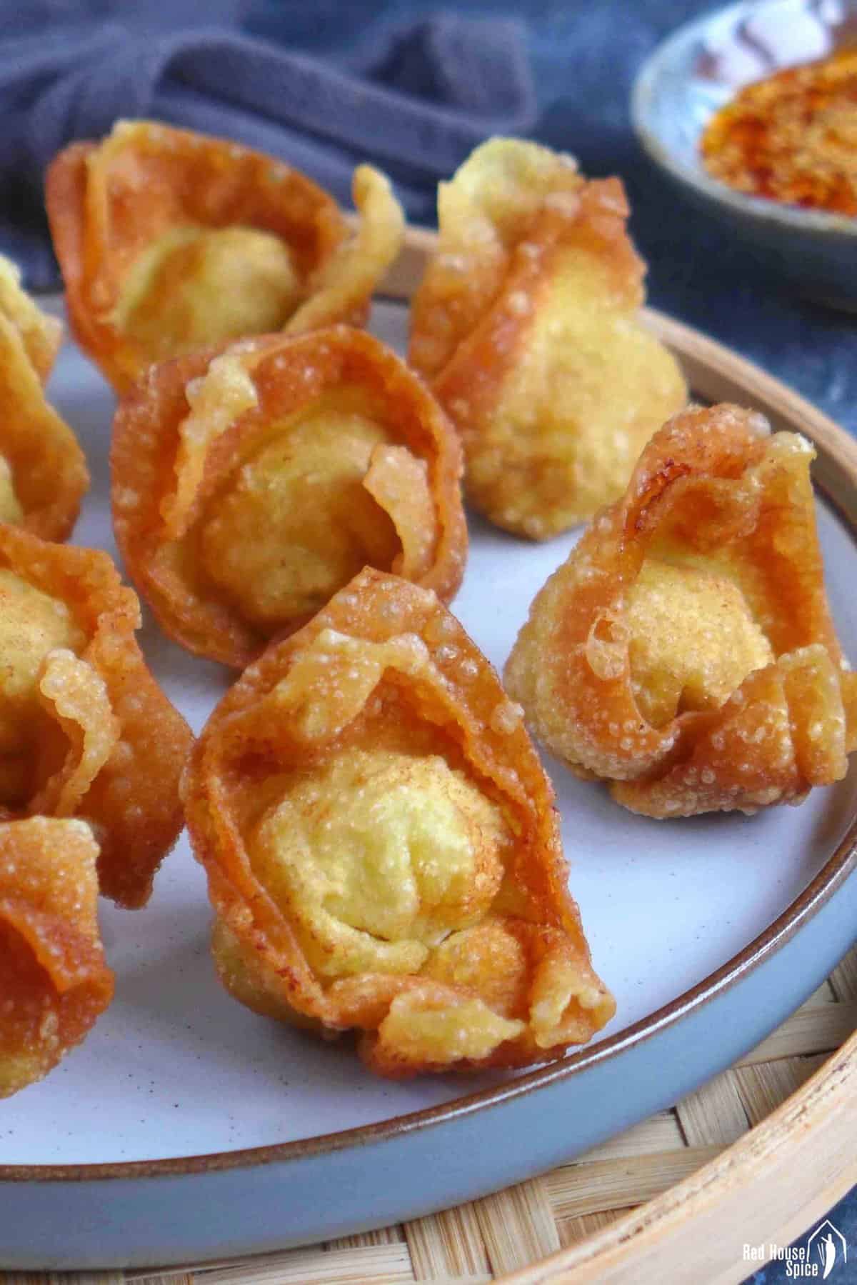 deep-fried wontons on a plate.