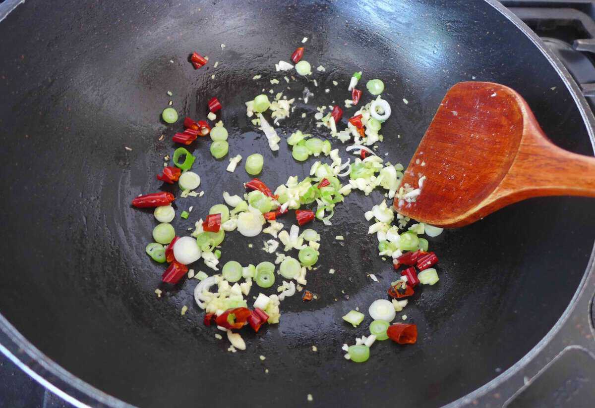 sizzling aromatics and chilies.
