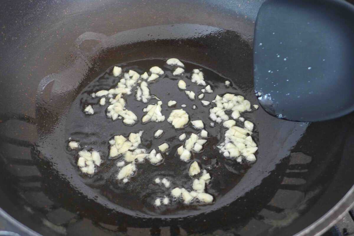 sizzling garlic in oil.