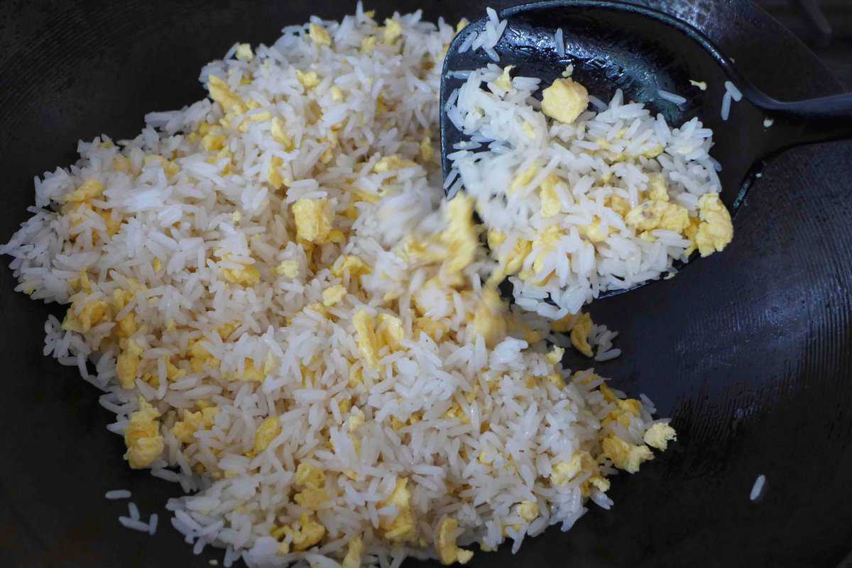 frying rice with eggs.