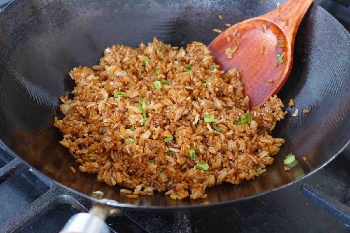 frying rice with soy sauce seasonings.