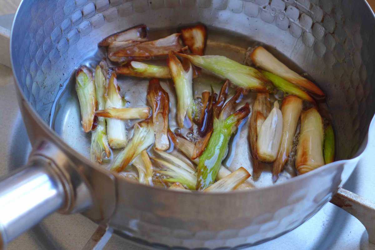frying scallion whites in oil.