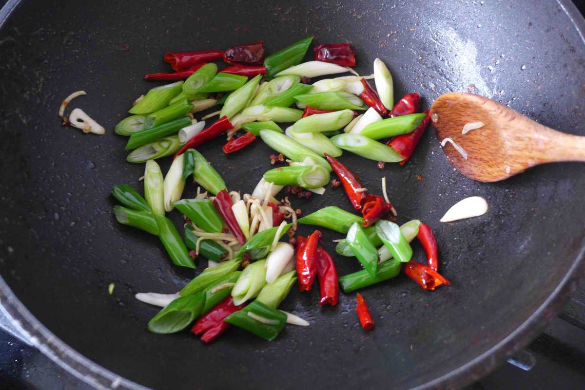 frying scallions, with spices.