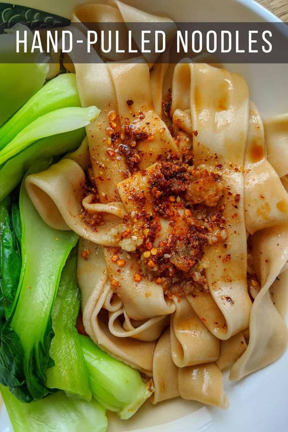 flat noodles with bok choy and spices