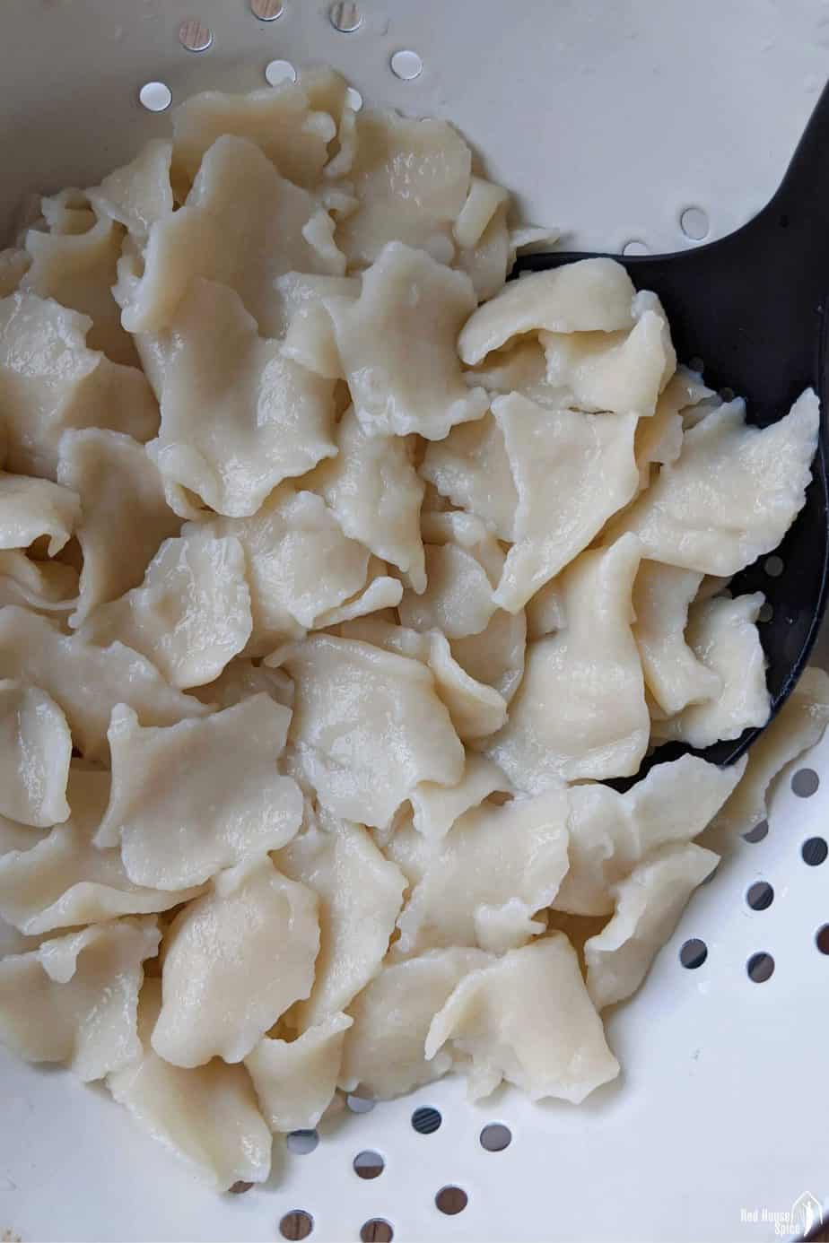 cooked hand-torn noodles