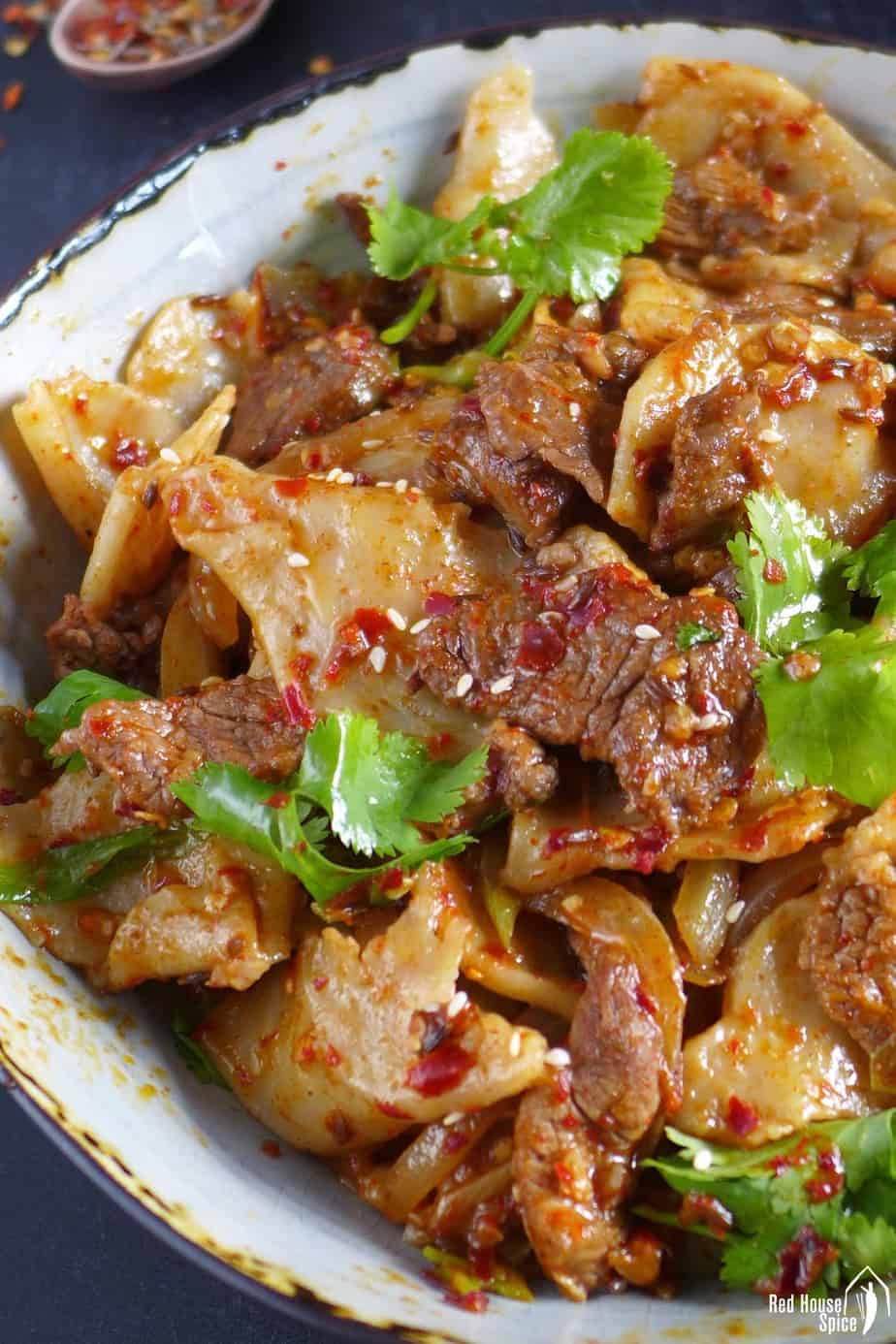 Hand-torn noodles mix with spicy lamb