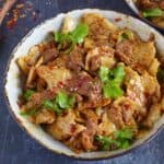 a bowl of spicy cumin lamb noodles