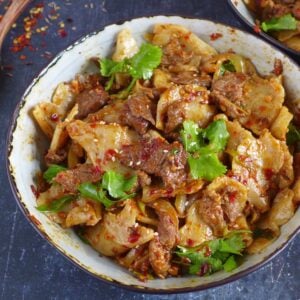 a bowl of spicy cumin lamb noodles