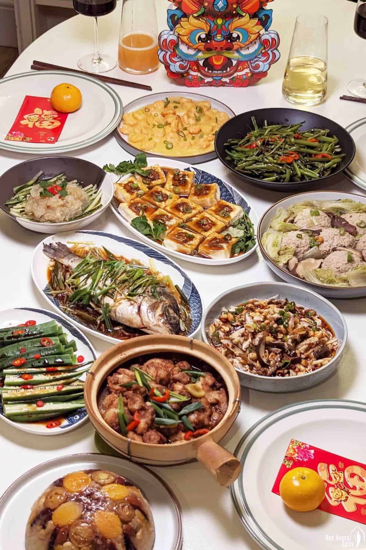 Multiple Chinese dishes on a table.