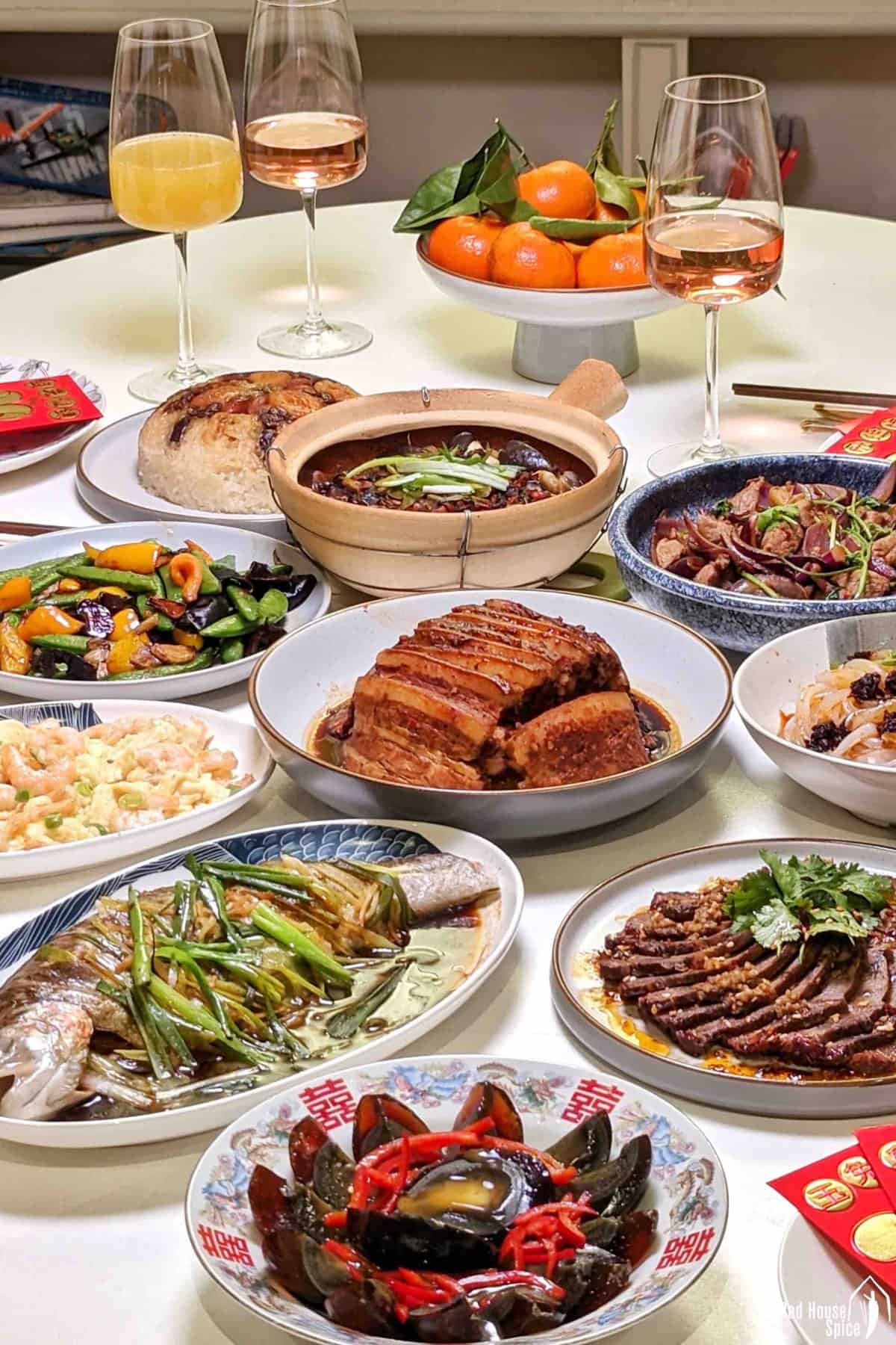 Multiple dishes on a table for Chinese New Year.