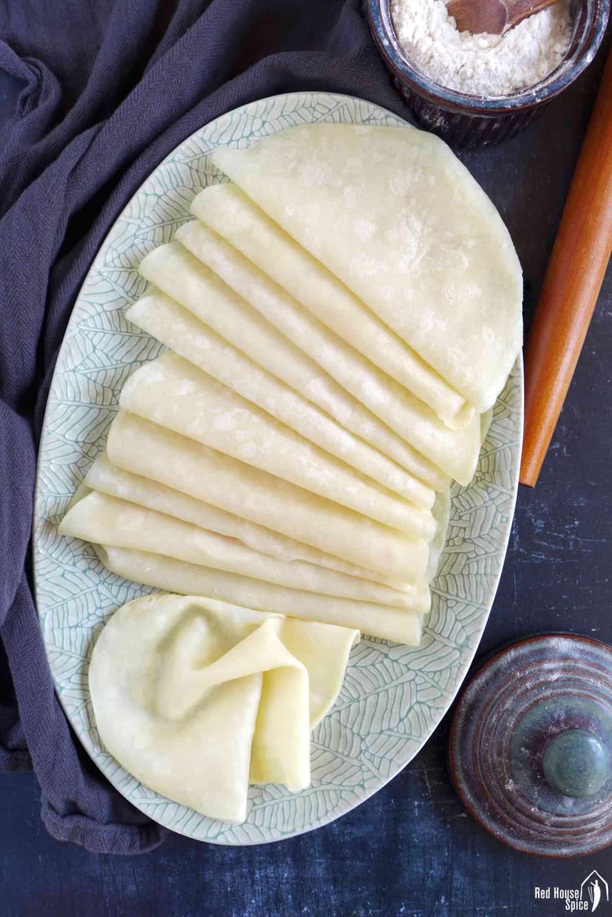 Peking duck pancakes on a plate.