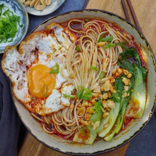 a bowl of hot and sour noodles.