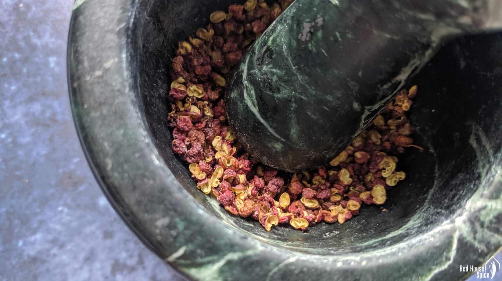 Roasted Sichuan pepper in a mortar