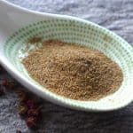 Ground Sichuan pepper in a spoon.