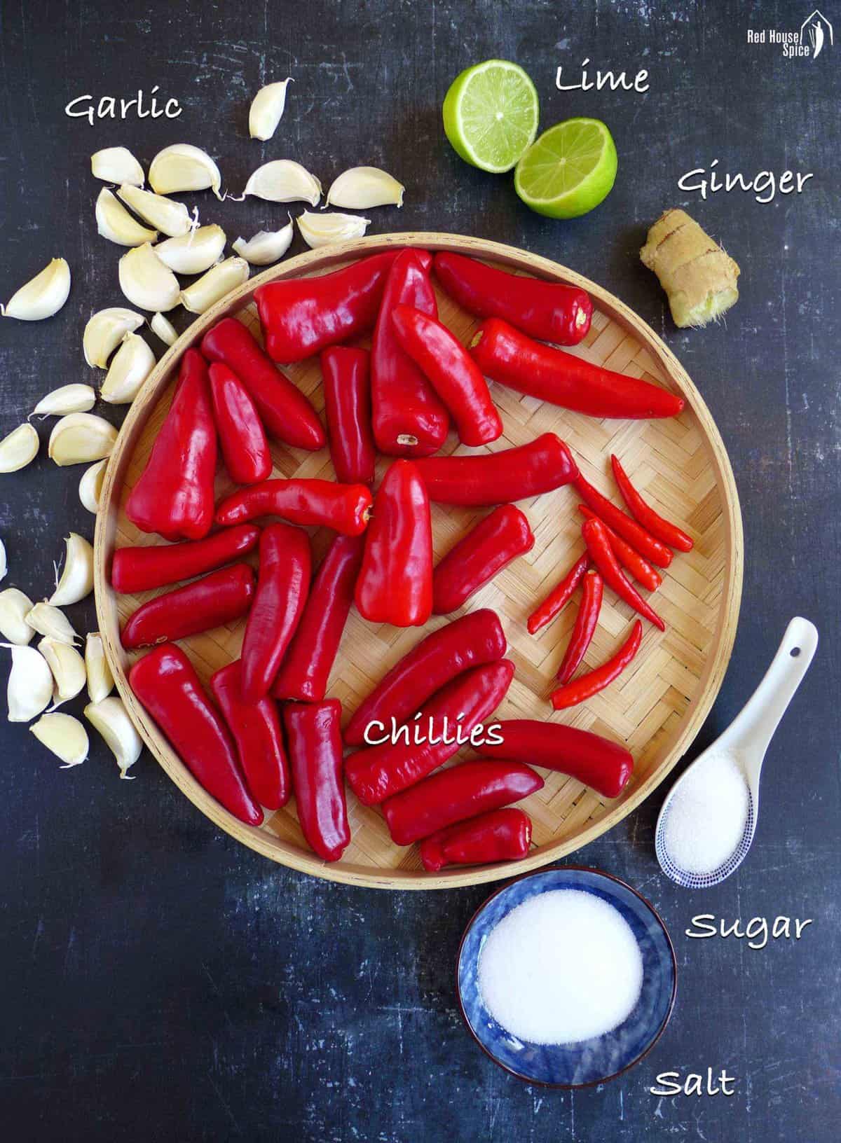 Recipe ingredients including chilies, garlic, lime, ginger, salt and sugar 